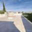T3/4 avec terrasse de quasi 100m², parkings et jardin!